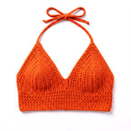 Model wearing red crochet bikini top.