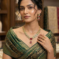 Ruby Red Kundan Necklace Set with Leaf Motifs & Earrings