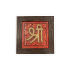 Front view of handcrafted Shree symbol stone painting in a dark wooden frame with red stone background
