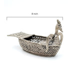 Decorative silver peacock-shaped basket with dimensions on a white background