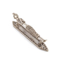 Decorative silver figure on a white background