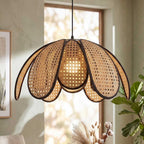Close-up of illuminated sugarcane flower pendant light hanging in a neutral interior