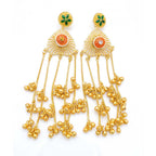 A pair of traditional Indian DI gold plated Jhumka earrings with green and orange enamel flowers and hanging bells, front view