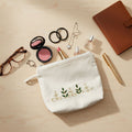 Hand-Embroidered Gotapatti Travel Pouch in Cream Canvas