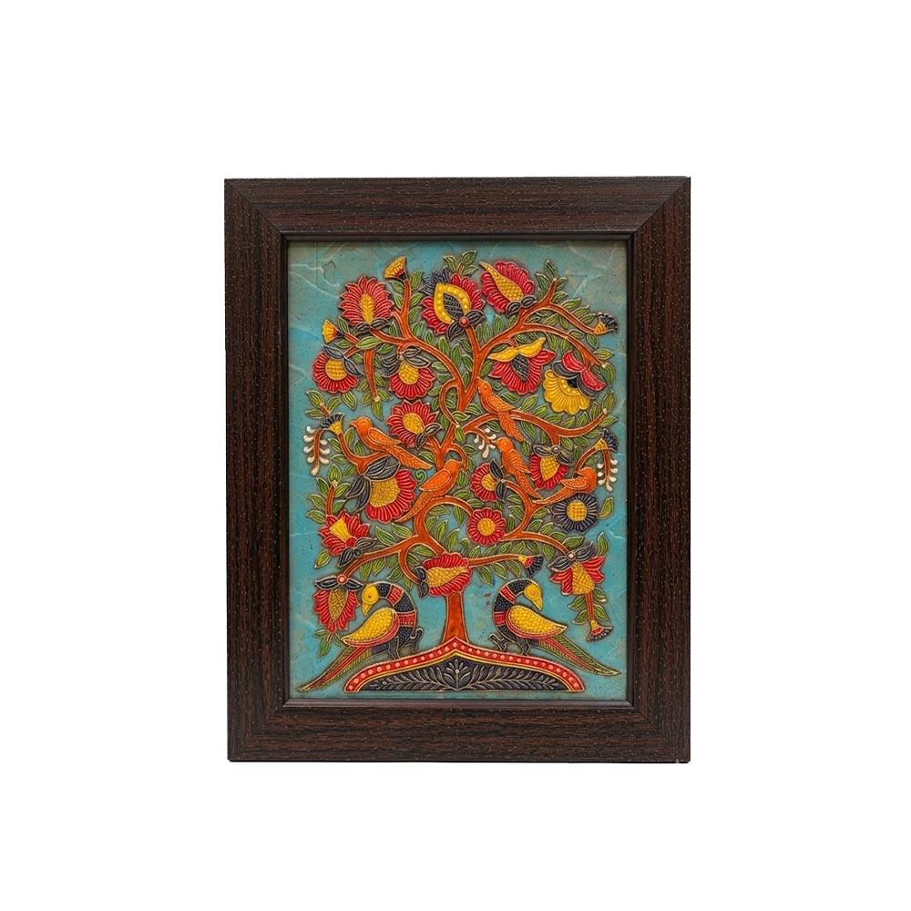 Front view of a handcrafted Tree of Life stone painting in a dark wood frame