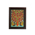 Handcrafted Tree of Life stone painting featuring colorful peacocks in a dark wooden frame, front view.