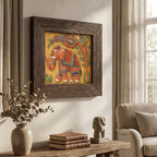 Angled view of the framed stone painting highlighting the texture and wood grain frame