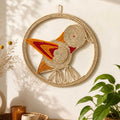 Kashi Grass Woven Bird Wall Art with Pink and Orange Accents