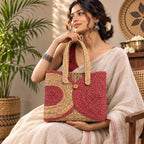 Handwoven Sabai Grass Tote Bag with Rose Pink Circular Design